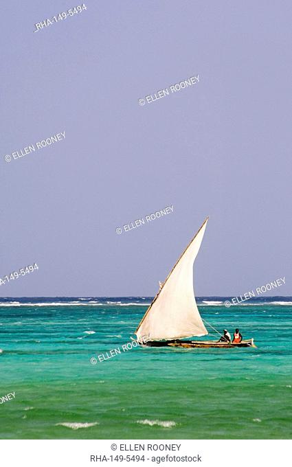 A traditional wooden sailing dhow near Mnemba Island, Zanzibar, Tanzania, East Africa, Africa
