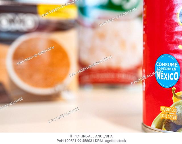 31 May 2019, Berlin: ""Consume lo hecho en Mexico"" (meaning: ""Buy what was produced in Mexico"") is written on the label of a can of Jalapenos