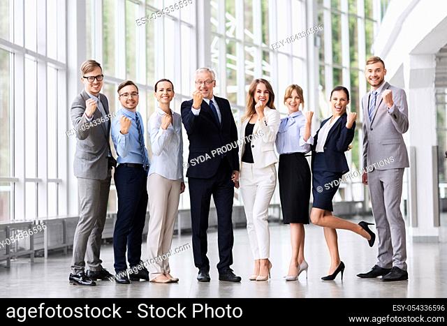 happy business team celebrating success at office