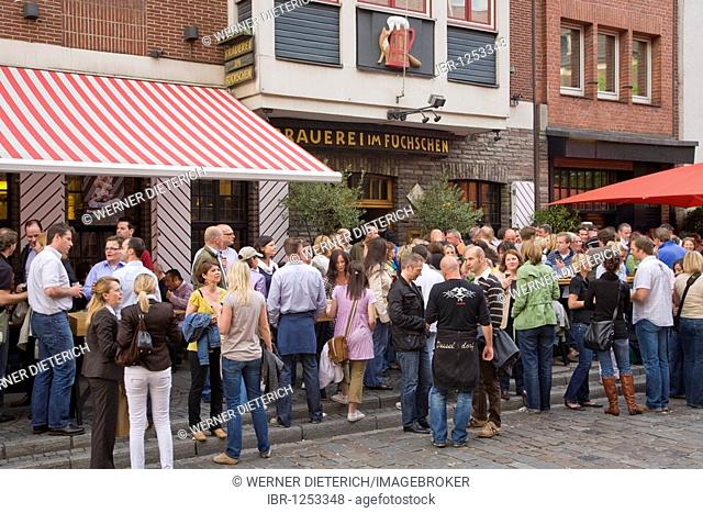 Brauerei im Fuechschen bar, beer bar, people, street scene, Ratinger Strasse street, historic centre, Duesseldorf, North Rhine-Westphalia, Germany