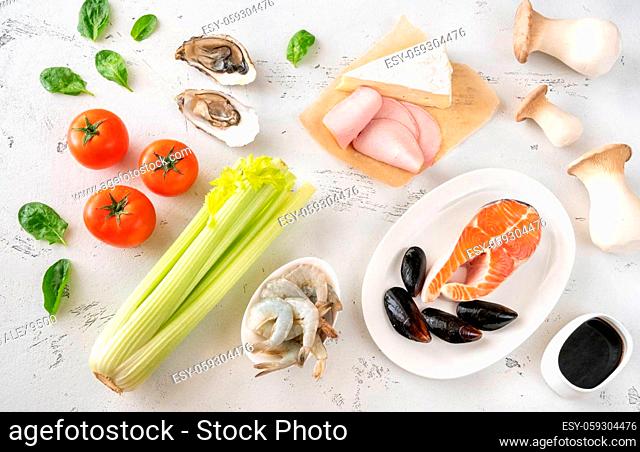 Assortment of Umami - rich foods on the white background