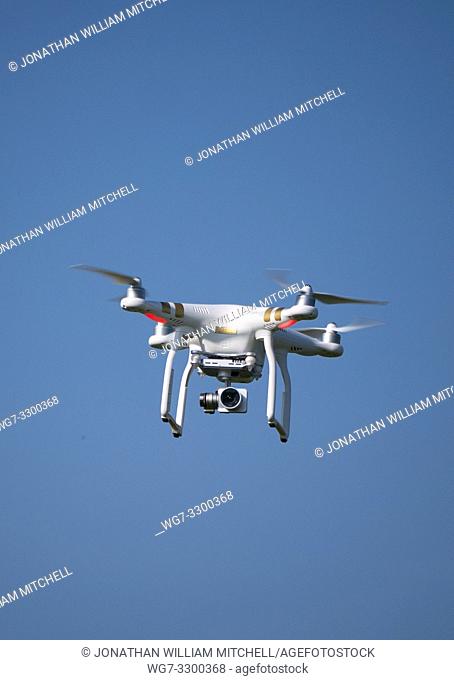 NORTHAMPTONSHIRE, UK - 21 April, 2019 - File image dated 20 Apr 2019 of a DJI Phantom 3 Pro drone in the air. A UK Airprox report has detailed a near-miss...