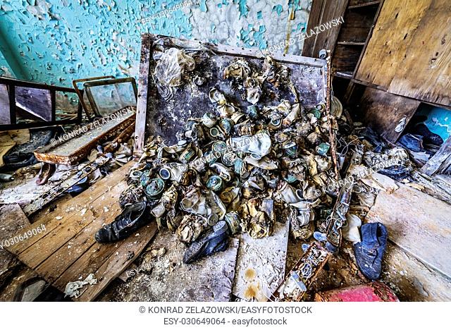 Old gas masks in abandoned Jupiter Factory in Pripyat ghost town of Chernobyl Nuclear Power Plant Zone of Alienation in Ukraine