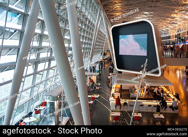 Zurich, Switzerland, Europe - Interior view of the Airside Center Terminal with its shops, cafes and restaurants at Zurich International Airport