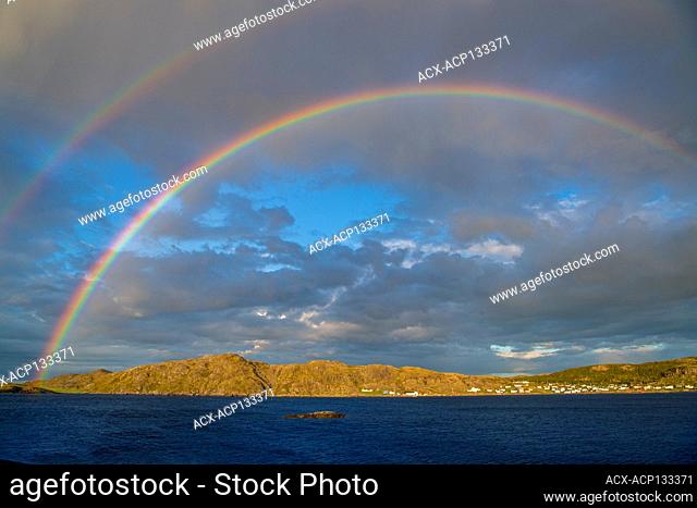 Rainbow over the town of Fogo, Fogo, Newfoundland and Labrador NL, Canada
