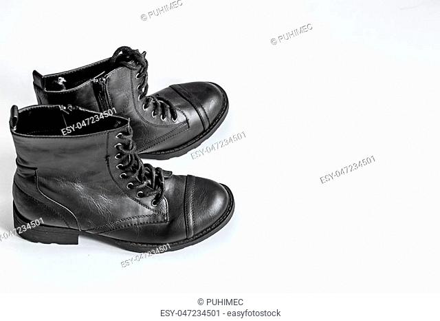 black high boots on a white background