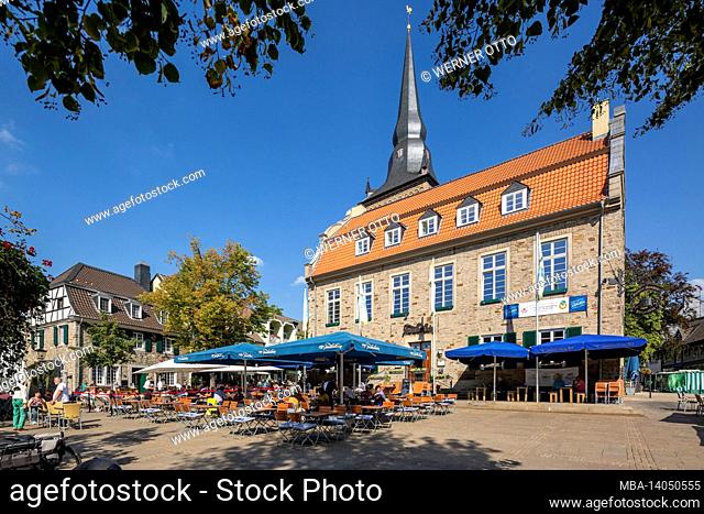 germany, ratingen, bergisches land, rhineland, north rhine-westphalia, market square, people sit in the street restaurant in front of the buergerhaus
