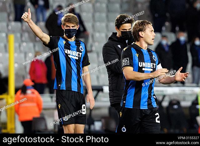 Club's Charles De Ketelaere and Club's Ruud Vormer celebrate after winning a soccer match between Club Brugge and SV Zulte Waregem