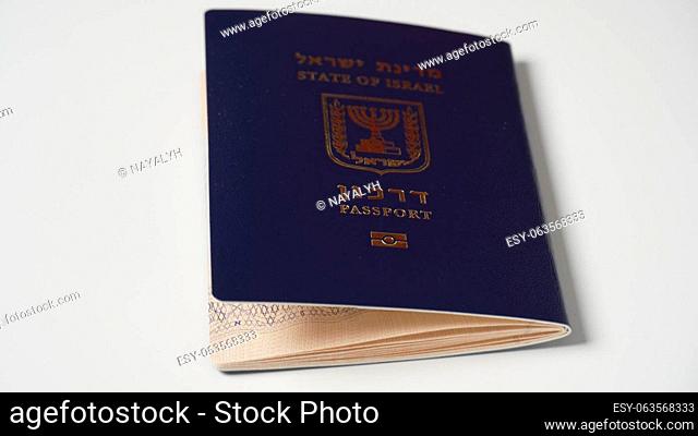 Blue Israeli passport (darkon). Passport with gold stamping Biometric sign