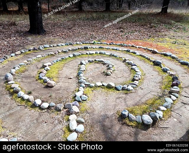 maze or spiral of rocks or stones on the ground outdoor