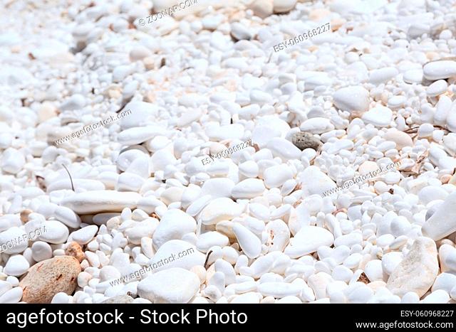 Summer vacation background texture with marble stones in Thasos Island, Greece