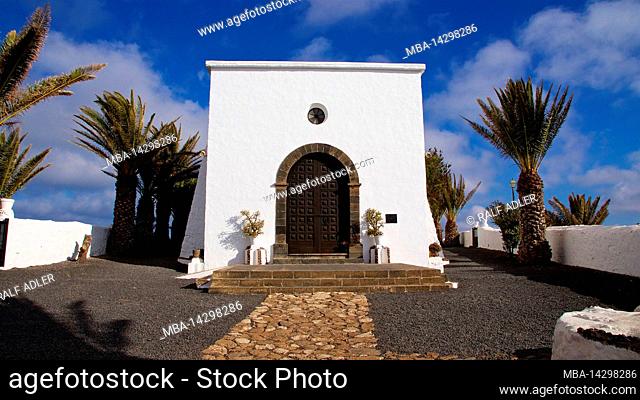 Canary Islands, Lanzarote, volcanic island, northwest coast, hermitage, church, Ermita de las Nieves, sky blue, white building of the Ermita, brown big door