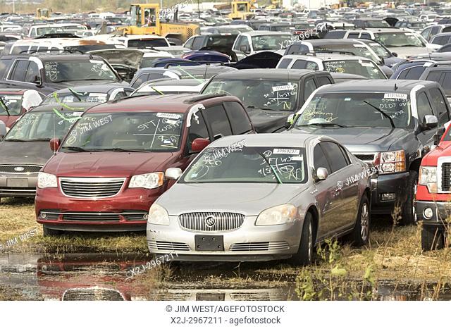 Baytown, Texas - Some of the hundreds of thousands of cars flooded when Hurricane Harvey dumped 50 inches of rain on the Houston area