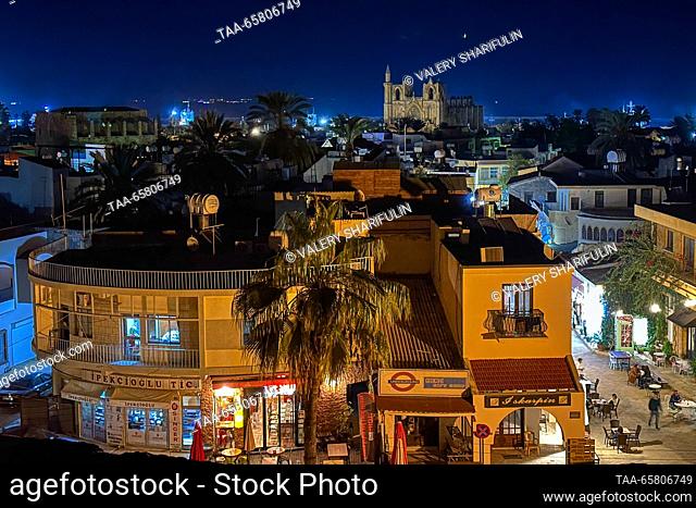 CYPRUS, FAMAGUSTA - DECEMBER 15, 2023: A panoramic view of the town at night. The Turkish Republic of Northern Cyprus is a de facto state declared independent...