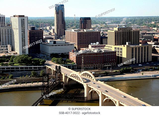 Aerial view of the bridge across the river with buildings in the background, Robert Street Bridge, Mississippi River, St. Paul, Minnesota, USA