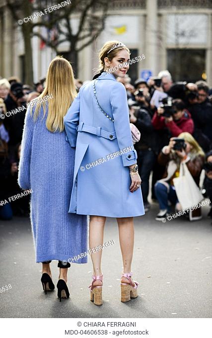 Italian influencer Chiara Ferragni and her sister Valentina Ferragni outside Miu Miu showroom during Woman Ready to Wear Fashion Week, Fall Winter 2017