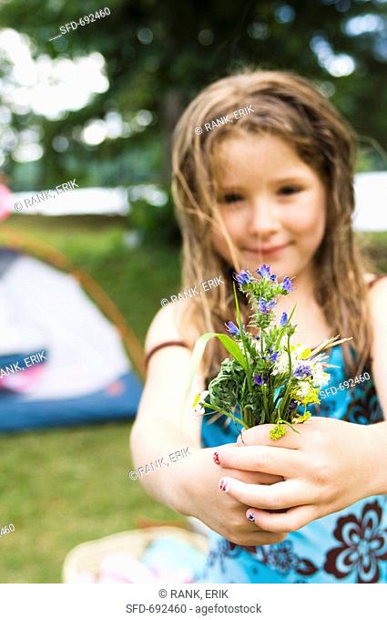 Young Girl Holding a Bouquet of Wildflowers, Campsite