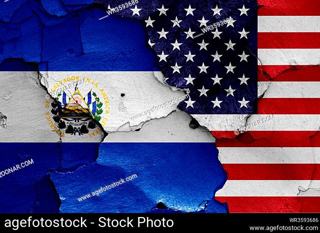 flags of El Salvador and USA painted on cracked wall