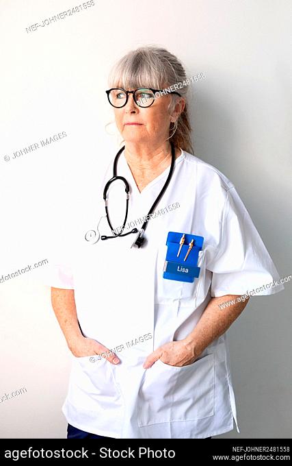 Female doctor looking away