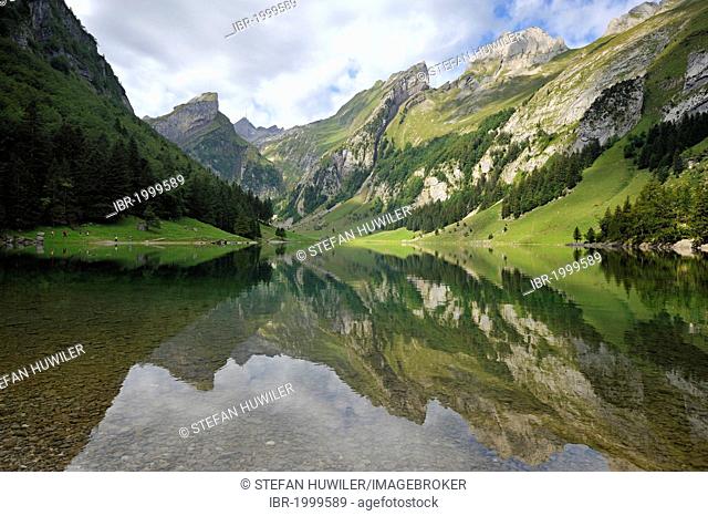 Lake Seealpsee in the Alpstein mountains, behind Mt. Saentis, Wasserau, Canton Appenzell, Switzerland, Europe