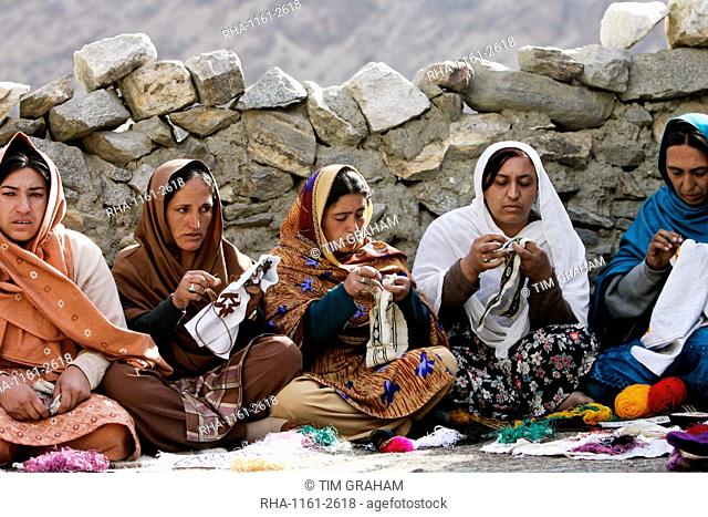 Women sew together in mountain village of Altit in Hunza region of Karokoram Mountains, Pakistan