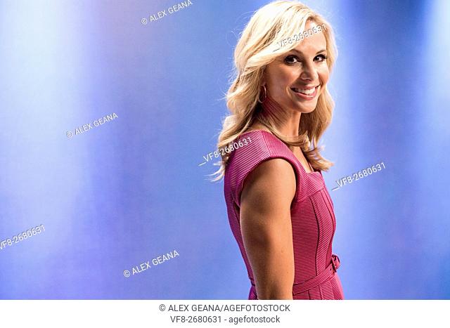TV personality Elisabeth Hasselbeck on set for an infomercial made to look like a TV set