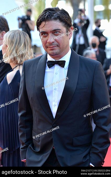 11 July 2021, France, Cannes: Riccardo Scamarcio attends the screening of the film ""Tre Piani"" during the 74th Annual Cannes Film Festival at Palais des...