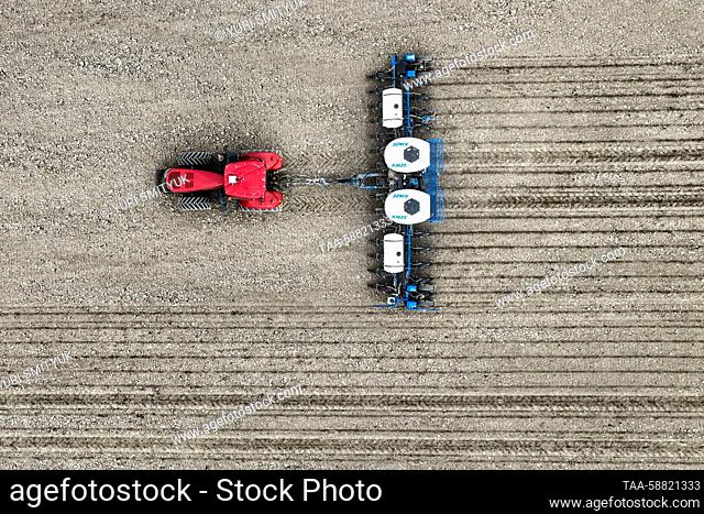 RUSSIA, PRIMORYE REGION - MAY 3, 2023: A sowing machine operates in a field of the Mishin Mikhail Yuryevich farm in the Oktyabrsky District