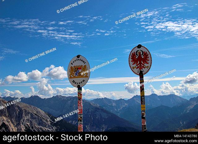 state border germany austria, border signs on the passamani circular hiking trail, karwendel mountains, mittenwald, bavaria, germany