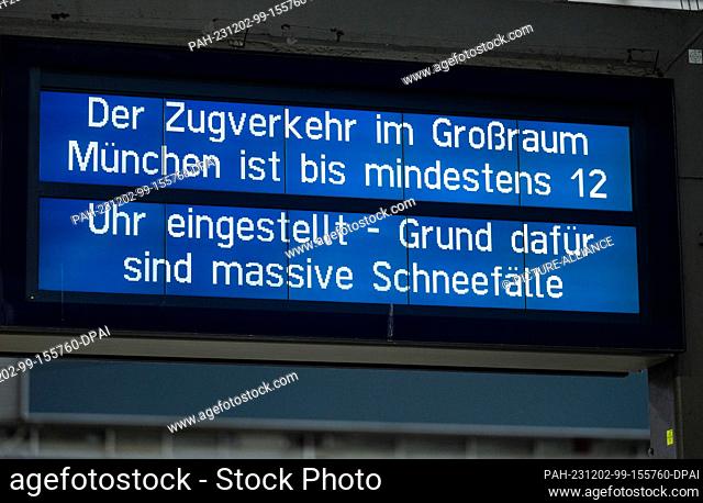 02 December 2023, Bavaria, Munich: A sign at the main station indicates that train services in the greater Munich area have been suspended