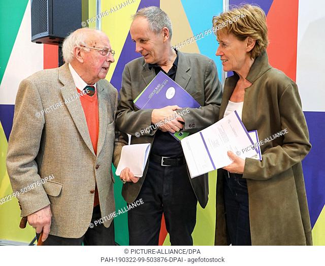 22 March 2019, Saxony, Leipzig: Andreas J. Meyer (l-r), publisher of Merlin-Verlag, stands next to Andreas Rostek and Dagmar Engel of ""edition