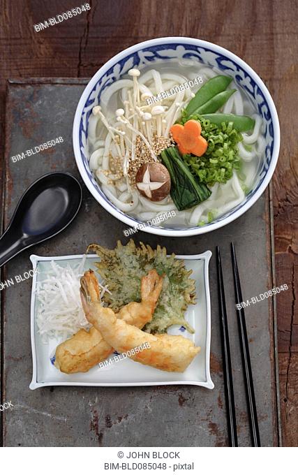 Udon noodle soup and battered prawn