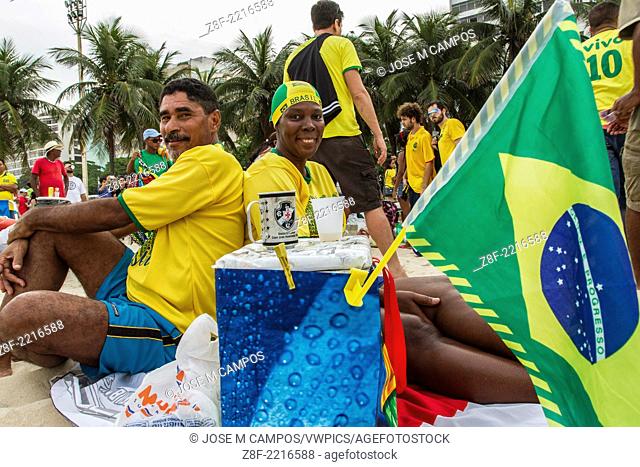 06/23/2014 Copacabana, Rio de Janeiro, Brazil. Brazilian fans attends to the FIFA Fan Fest to watch their national football team face Cameroon during the first...