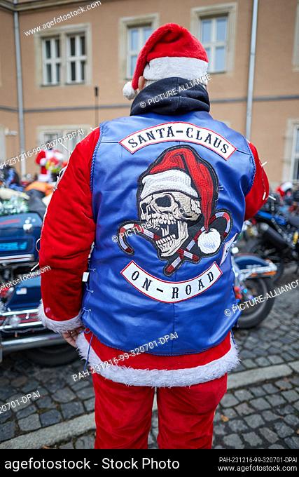 16 December 2023, Berlin: Disguised bikers start at Lankwitz town hall on a charity tour through Berlin. The final stop will be the Christmas market at...