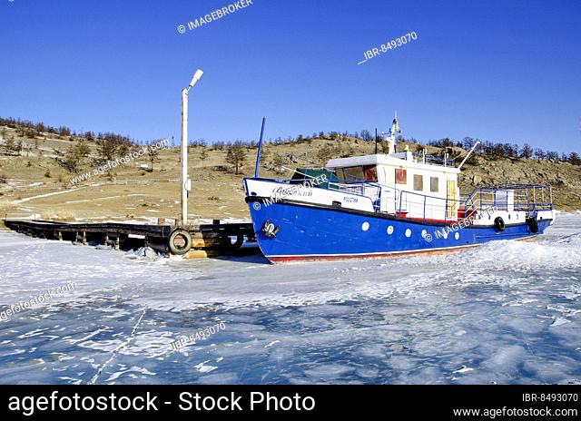 Boat stuck by the ice, Lake Baikal, Olkhon Island, Pribaikalsky National Park, Irkutsk Province, Siberia, Russia, Europe