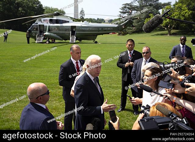 US President Joe Biden speaks to members of the news media before departing the South Lawn of the White House en route to Delaware, in Washington, DC, USA