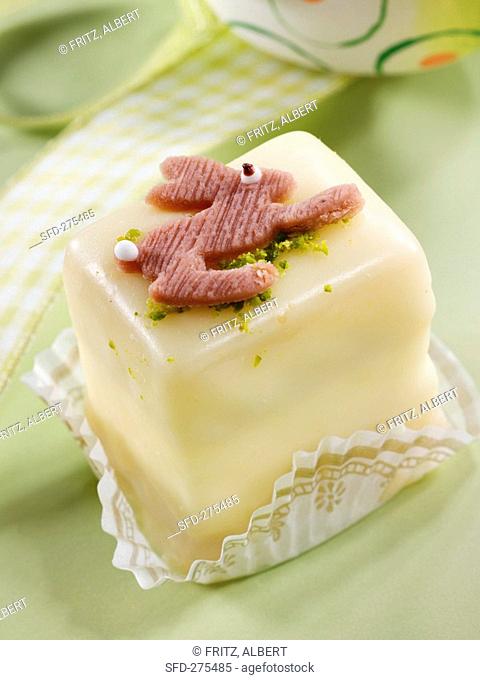 A petit four decorated with an Easter Bunny