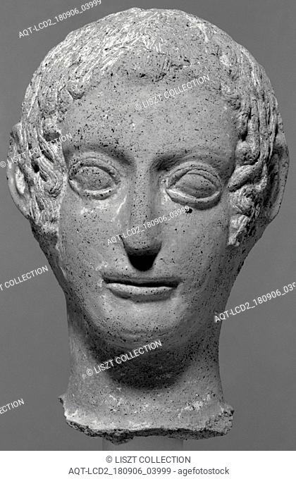 Head of a Votive Statue; Etruria; about 450 B.C; Terracotta with polychromy; 29.7 cm (11 11, 16 in.)