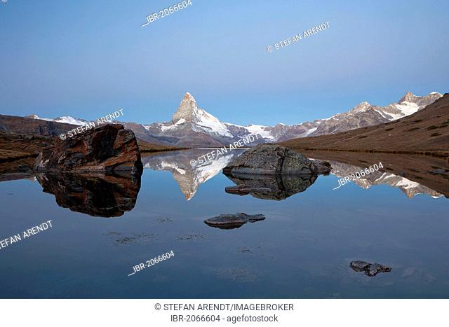 Early morning at Stellisee Lake overlooking Mt Matterhorn, Zermatt, Valais, Swiss Alps, Switzerland, Europe, PublicGround