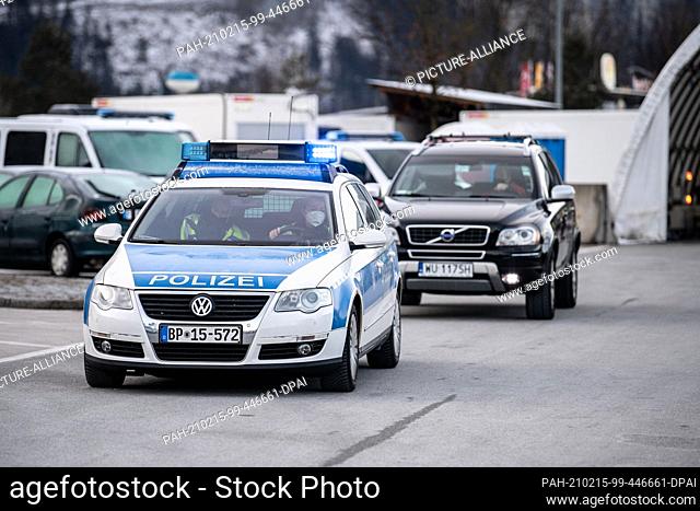 15 February 2021, Bavaria, Kiefersfelden: Federal police escort rejected travellers coming from Austria back to Austria on the A93 motorway near Kiefersfelden