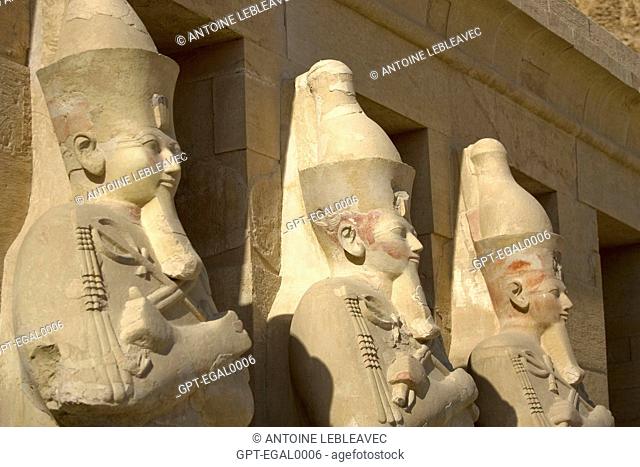 OSIRIS STATUES, UPPER TERRACE, QUEEN HATSHEPSUT’S FUNERARY TEMPLE IN DEIR EL-BAHRI, SPEOS, BUILT AT THE FOOT OF THE WEST FACE OF THE THEBAN MOUNTAIN ON THREE...