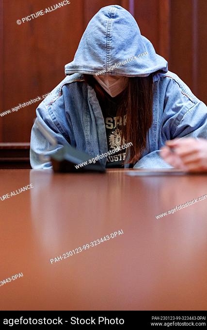 23 January 2023, Bavaria, Bayreuth: The accused 17-year-old young woman sits in the courtroom in the regional court. At the beginning of January 2022