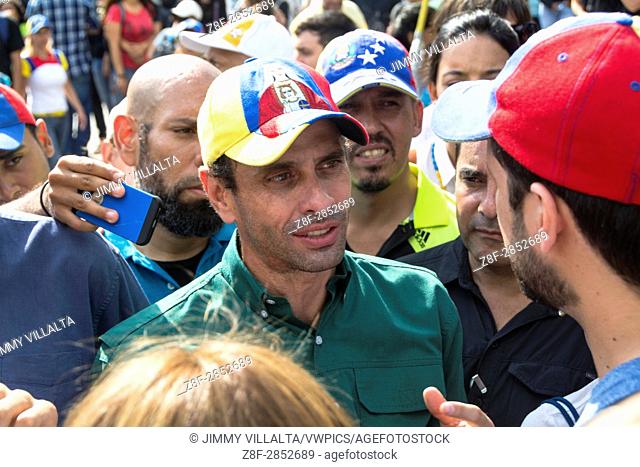 Henrique Capriles Radonski, governor of the Miranda state, and recently politically disabled for 15 years, speaks with a student in homage to the murdered young...