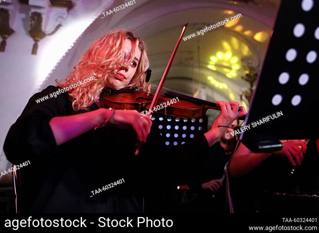 RUSSIA, MOSCOW - JULY 8, 2023: Musicians of the Imperialis Orchestra perform during a concert at the Arbatskaya station of the Moscow Metro marking Moscow...