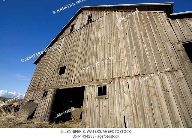 Distorted view of an old barn shot with a wide angle lens. Near Spangle, Washington, USA