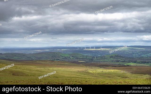 Several large wind turbines seen from Cuilcagh Boardwalk. Irish green wind energy generation. County Fermanagh, Northern Ireland