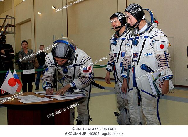 At the Gagarin Cosmonaut Training Center in Star City, Russia, Expedition 4243 backup crewmember Kjell Lindgren of NASA signs in for the first of two days of...