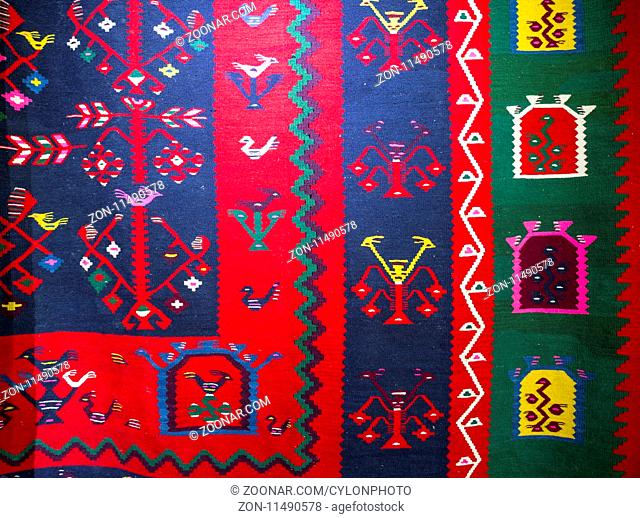Chiprovtsi Carpets (rugs). Traditional colorful carpets from Chiprovtsi region in Bulgaria. Hand-woven (hand-made) carpets with different elements and colours