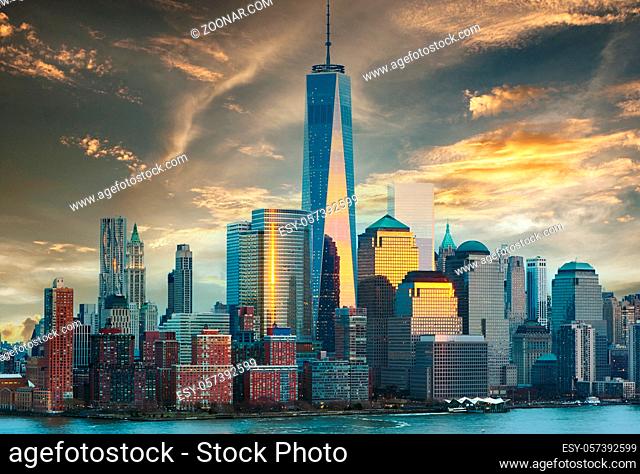 New York City Manhattan skyline at sunset over Hudson River viewed from New Jersey