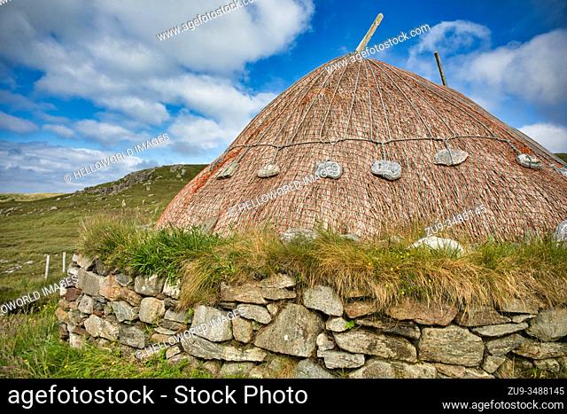 Reconstructed Iron Age House, Bostadh, Great Bernera, Isle of Lewis, Outer Hebrides, Scotland. A 1993 storm revealed stonework thought to belong to four houses...